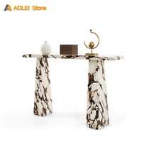 Table console en marbre Calacatta Viola à pieds trapézoïdaux haut de gamme, idéale pour la décoration de maisons de luxe et les entrées d'hôtels de prestige