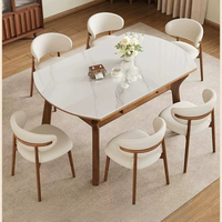Table et chaises de salle à manger haut de gamme en bois avec plateau en pierre, idéales pour les maisons traditionnelles et les appartements de petite taille - modèle varié