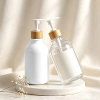 Botol Lotion Plastik Logo Kustom Amber Bening Putih Hitam Isi Ulang untuk Sabun Mandi Sampo 300 ml 500ml dengan Pompa Bambu