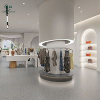 Présentoir mural en spirale moderne de qualité supérieure pour vêtements, idéal pour les boutiques de robes féminines et les présentoirs de vêtements en boutique