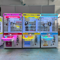 Mini machine à griffes pour enfants, jouet en peluche, machine à griffes à pièces, petit distributeur de cadeaux, machine à griffes à bonbons, jeux d'arcade