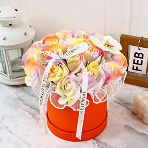 Emballage cadeau en papier à cylindre rond avec logo personnalisé Boîte à fleurs avec poignée en ruban Fourniture directe d'usine de cosmétiques bijoux