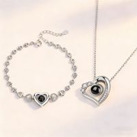 Collier unisexe personnalisé avec projection photo en forme de cœur en acier inoxydable plaqué or et zircon, idéal pour le dropshipping de bijoux