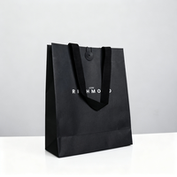 Sac fourre-tout en papier noir de luxe écologique personnalisé avec logo sur mesure et poignée renforcée pour la promotion de la marque et une utilisation promotionnelle