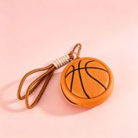 Porte-monnaie en silicone avec pendentif porte-clés, accessoire portable de dessin animé, sac de rangement pour câble de données et écouteurs, logo personnalisé