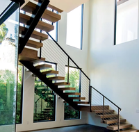 Escalier droit en acier inoxydable Prima Premium avec double poutre et garde-corps en verre pour bureaux, hôtels et espaces commerciaux