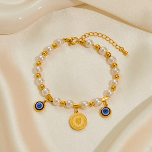 Pulsera fina de gama alta, elegante, de acero de titanio, acero inoxidable, encantador diseño Floral, Concha blanca, ojos azules - Product Image 5
