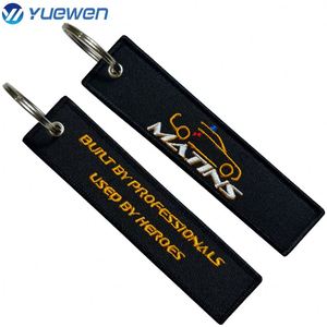 Porte-clés tissé personnalisé avec logo brodé pour avion, en tissu, avec nom de marque, vente en gros à prix réduit - Product Image 2