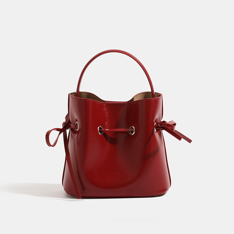 Qinm's New Drawstring Bag Features A Unique And High-quality Design. It Can Be Carried Diagonally On One Shoulder, Exuding An El
