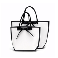 Sac en papier carton blanc avec ruban noir Boîtes d'emballage Shopping Sac à main Boîte à lunch Conteneur alimentaire Bowknot Cadeaux Sacs