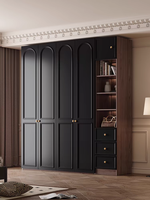 Armoire à portes battantes en placage de bois noir, style Mid-Century, lignes épurées, meuble de chambre