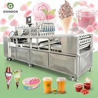 Machine de remplissage et de scellage rotative pour coupes, cornets de crème glacée, emballages, coupes/bouteilles/canettes/plateaux, avec système de scellage solide à disque et de scellage par compression