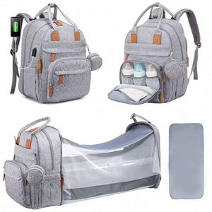 Muestra gratuita de mochila multifuncional para viajes al aire libre, bolsa de pañales para bebé, mochila grande para mamá con cuna plegable para bebé - Product Image 1