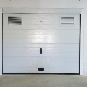 Vente en gros <span class=keywords><strong>de</strong></span> <span class=keywords><strong>porte</strong></span> <span class=keywords><strong>de</strong></span> <span class=keywords><strong>garage</strong></span> automatique monobloc en acier conception latérale 9x9 moderne isolation thermique finie pour les villas à bas prix - Product Image 4