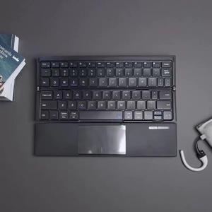 <span class=keywords><strong>2025</strong></span>跨界新款月光宝盒触摸板三折BT键盘平板笔记本皮革式折叠键盘 - Product Image 6