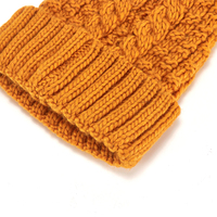 Gorro de punto de algodón amarillo personalizado al por mayor para fabricantes, gorro de invierno cálido de moda estilo hip-hop con bordado 3D, ideal para viajes.