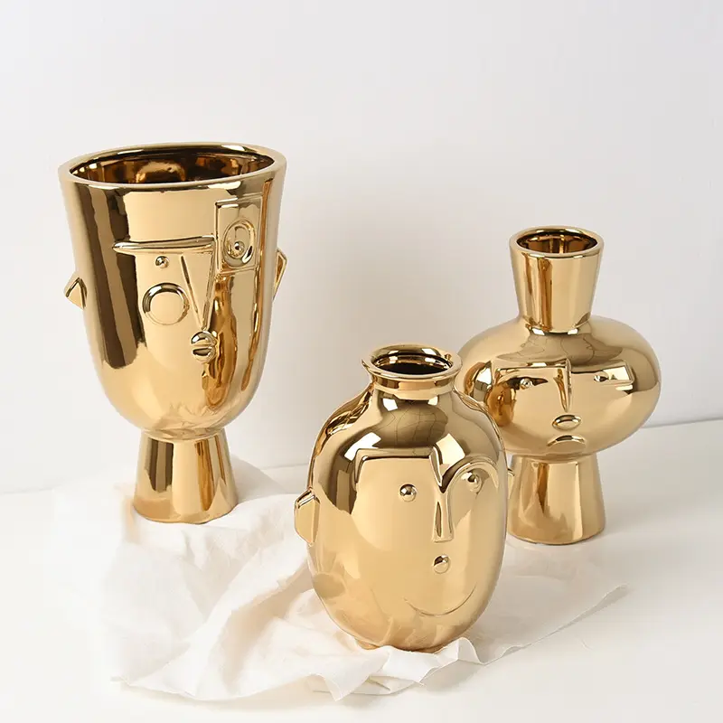 Luxus kreatives Design Golden Head Statue Blumenvase Moderne Kunst Abstrakte Seiten gesichts vase Keramik kopf vasen Großhandel