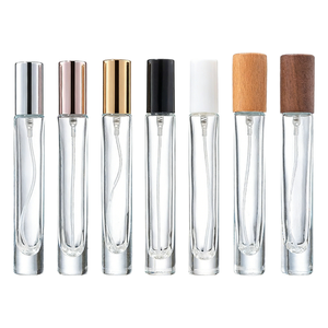 Flacon de <span class=keywords><strong>parfum</strong></span> rond en verre transparent de haute qualité, sur mesure OEM, à fond épais, avec bouchon à vis et <span class=keywords><strong>diffuseur</strong></span>, 10 ml - Product Image 1