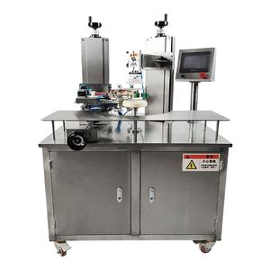 เครื่องปิดผนึกกล่องอัตโนมัติสำหรับขวดทรงกลมและกล่องคุกกี้ช็อกโกแลต พร้อมเทปพันรอบและเครื่องปิดผนึกกระป๋องขนม - Product Image 1