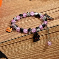 Bracelet extensible Halloween 2025 avec perles de cristal noires et violettes, breloques citrouille, château et chauve-souris, cadeau