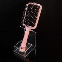 Accueil Boutique Magasin de détail Vente en gros de présentoir de chignon à dents en forme de L simple support pour ensemble de brosses à cheveux présentoir de peigne