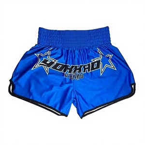 กางเกงมวยไทยยี่ห้อโยค้าเอวยางยืดสูง ระบายอากาศได้ดี ผลิตจากโพลีเอสเตอร์ 100% มีโลโก้ด้านหน้า เหมาะสำหรับการฝึกซ้อมมวยและศิลปะการต่อสู้ - Product Image 3