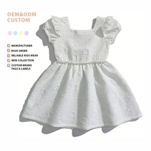 Üst Düzey Özel Tasarım ODM Parti Elbisesi Saf Beyaz Yuvarlak Yaka Sırtı Açık Fiyonklu Puf Kollu Nefes Alabilen Elbise Dokulu 3D Kumaş Geniş Etek Tatlı - Product Image 1