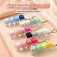 Porte-clés anti-stress en PVC style clavier macaron à quatre boutons, avec touches lumineuses – Jouet de décompression DIY pour tous les âges