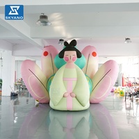 Modèle gonflable personnalisé de fille-lotus de dessin animé pour la publicité et la décoration d'activités en plein air sur les toits de sites touristiques