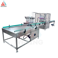 Ligne de remplissage électrique automatique WJER-80 BOV contrôlée par PLC pour applications chimiques et cosmétiques avec têtes de nettoyage de soupapes