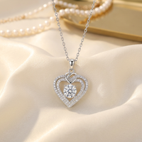 Nouveau collier pendentif cœur en moissanite taille brillant ronde 6,5 mm 1 carat en argent sterling 925 pour femme, bijoux certifiés GRA