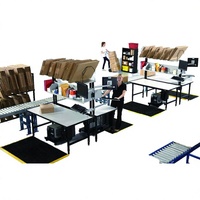 Banc de travail en acier industriel avec accessoires modulaires pour l'emballage en entrepôt, fabricant OEM
