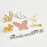 Étiquettes métalliques personnalisées pour vêtements, badges et logos sur mesure pour sacs