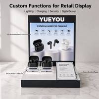 Support de présentation antivol pour écouteurs TWS en acrylique éclairé par LED avec plaque de marque personnalisée Yueyou B036 pour comptoir/bureau
