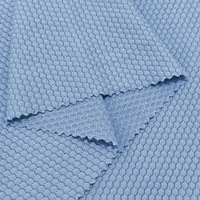 Vente directe d'usine, tissu en nylon tricoté à bulles, jacquard circulaire, lavable, séchage rapide, respirant, tissu pour t-shirt de sport pour homme