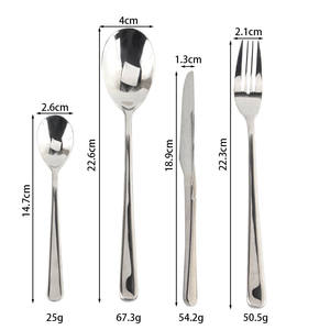 elegant flatware features flaring <b>handles</b> and subtle <b>bands</b> that highlight the narrow necks and wide tips Flatware Set - Product Image 6