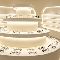 Vitrines d'exposition de lunettes personnalisées, rondes, optiques, éclairées par LED, de haute qualité, durables et écologiques