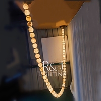 Lustre en albâtre naturel, lumière linéaire longue, tailles personnalisables, styles multiples, adapté aux escaliers, aux halls et aux salons