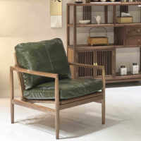 Fauteuil de détente en bois massif et cuir PU de style mid-century pour chambre et salon, design durable et écologique