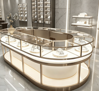 Vitrine d'exposition élégante en verre avec éclairage LED pour bijouterie, idéale pour les magasins de détail et centres commerciaux, pour la présentation de la marque et la conception de bijouteries.
