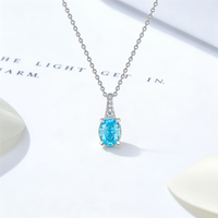Collier élégant Damila Jewelry, bleu clair ovale, coupe Ice Flower, zircone cubique blanche, plaqué platine, argent 925, pendentif