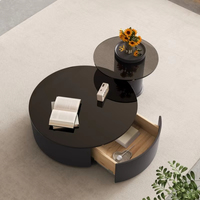 Ensemble de tables basses rondes en bois noir, design moderne et durable, respectueux de l'environnement, mobiles pour le salon