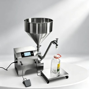 Machine de remplissage d'huile moteur et machine de remplissage automatique d'huile pour lubrifiants et huiles moteur en bouteilles en plastique et bidons métalliques - Product Image 1