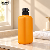 Bouteille orange de 700 ml, emballage pour soins personnels, forme moderne, bouteille à pompe en PE, épaisseur personnalisée, étiquetage pour gel douche