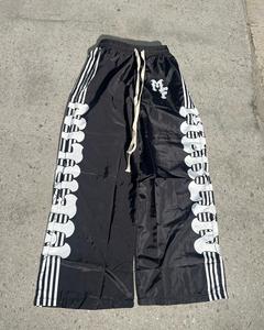 <span class=keywords><strong>Pantaloni</strong></span> Sportivi in Nylon 100% <span class=keywords><strong>Pantaloni</strong></span> da Jogging <span class=keywords><strong>Oversize</strong></span> da Uomo <span class=keywords><strong>Pantaloni</strong></span> Larghi <span class=keywords><strong>Pantaloni</strong></span> Sportivi in Nylon - Product Image 3