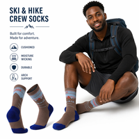 Chaussettes en laine mérinos mi-tube pour dames épaisses Chaussettes chaudes de stockage de chaleur pour le logo de randonnée en montagne en plein air positionné en bas