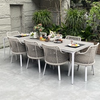 Mobilier moderne de salle à manger d'extérieur combinaison de chaise de table en rotin tressage corde de loisirs pour cour jardin villa terrasse hôtel