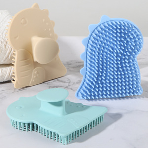 Cepillo de baño de silicona con forma de dinosaurio, cerdas suaves, cepillo para masaje y lavado del cabello para bebés y niños - Product Image 1