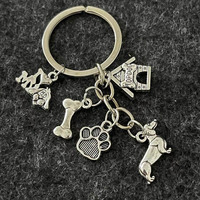 Porte-clés Vintage en Argent avec Empreinte de Patte et Os, Breloque Teckel, Cadeau pour Amoureux des Chiens et Propriétaires d'Animaux – Vente en Gros