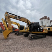 Excavatrice sur chenilles Caterpillar 320D d'occasion en bon état, pièces d'origine, pour projet de construction